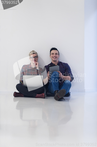 Image of startup business, couple working on laptop computer at office