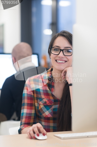 Image of startup business, woman  working on desktop computer