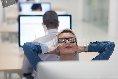 Image of startup business, woman  working on desktop computer