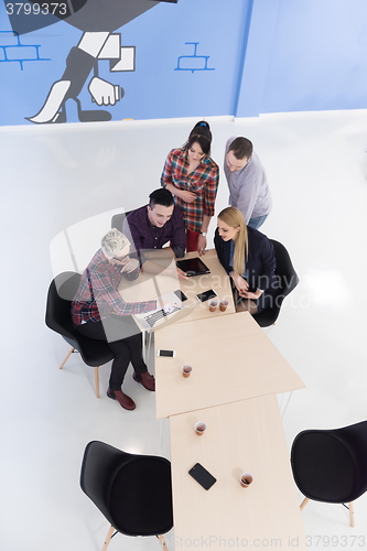 Image of aerial view of business people group on meeting