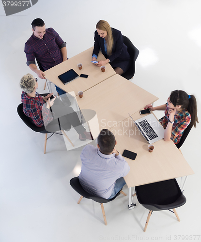 Image of aerial view of business people group on meeting