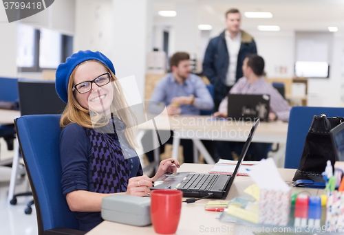 Image of startup business, woman  working on laptop