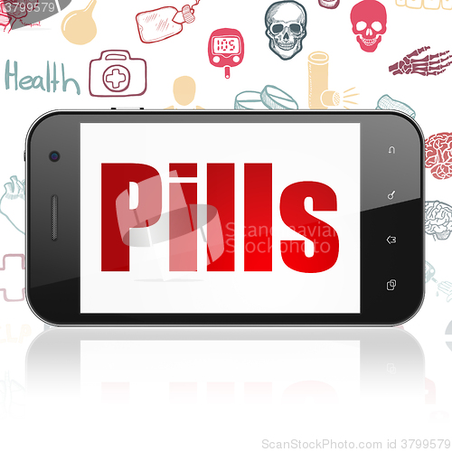 Image of Healthcare concept: Smartphone with Pills on display