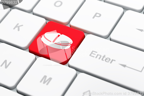 Image of Medicine concept: Pill on computer keyboard background