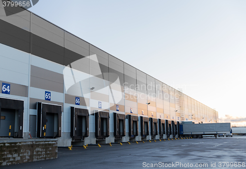 Image of warehouse gates and truck loading