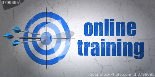 Image of Studying concept: target and Online Training on wall background