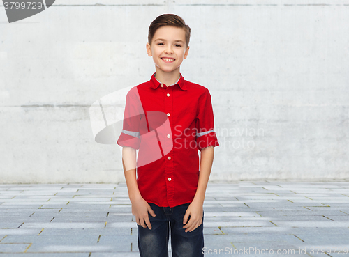 Image of happy boy in red shirt