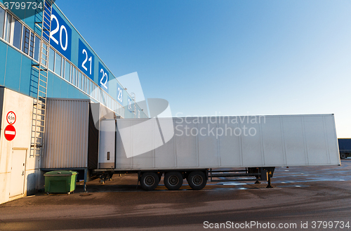 Image of warehouse gate and truck loading