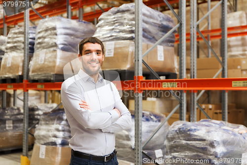 Image of happy man at warehouse