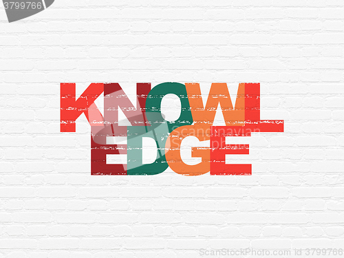 Image of Education concept: Knowledge on wall background