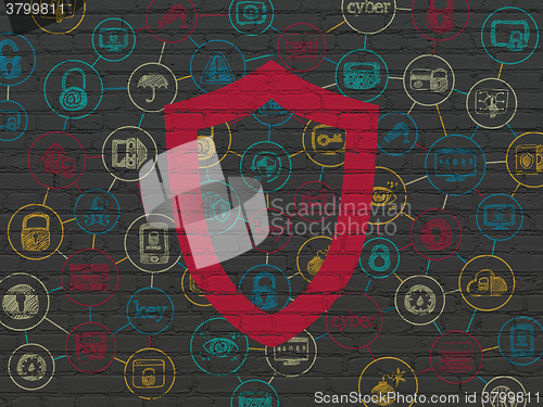 Image of Safety concept: Contoured Shield on wall background