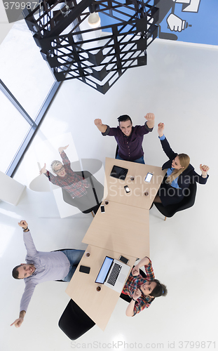 Image of aerial view of business people group on meeting