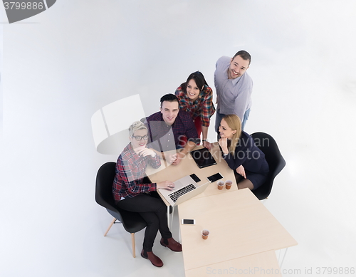 Image of aerial view of business people group on meeting