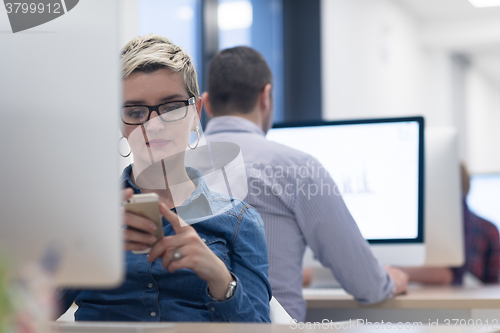 Image of startup business, woman  working on desktop computer