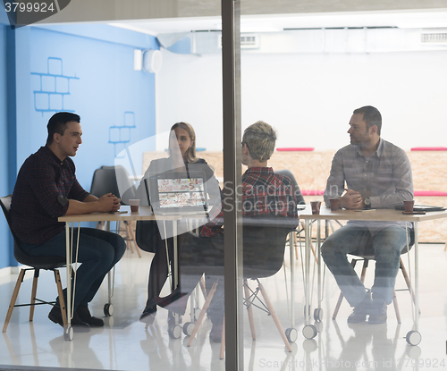 Image of startup business team on meeting at modern office