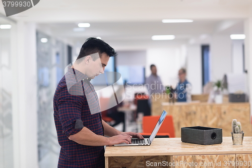 Image of startup business, young  man portrait at modern office