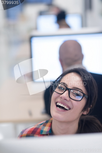 Image of startup business, woman  working on desktop computer