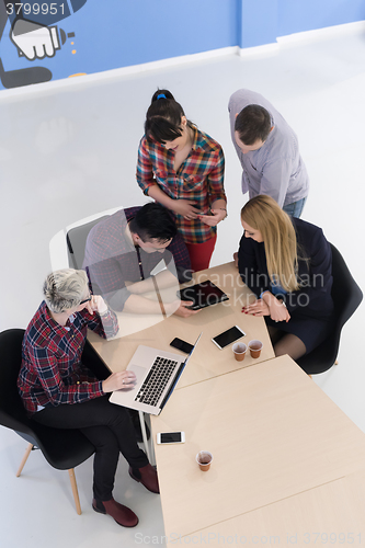 Image of aerial view of business people group on meeting