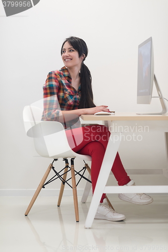 Image of startup business, woman  working on desktop computer