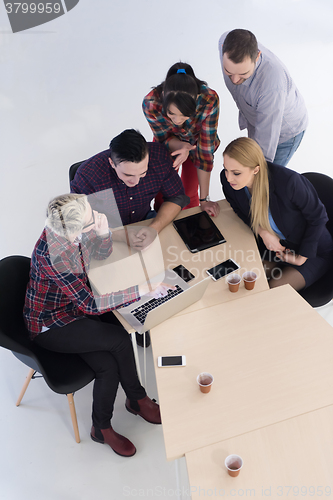 Image of aerial view of business people group on meeting