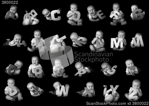 Image of Baby posing alphabet letters