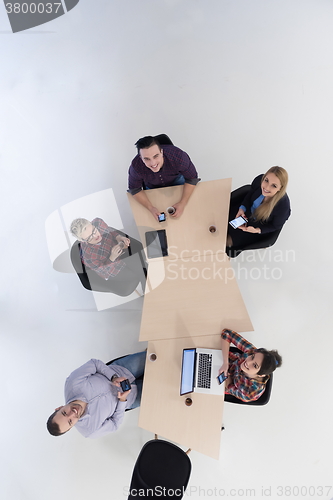 Image of aerial view of business people group on meeting