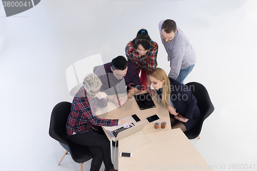 Image of aerial view of business people group on meeting