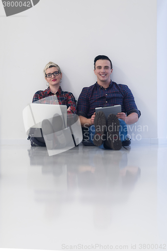 Image of startup business, couple working on laptop computer at office