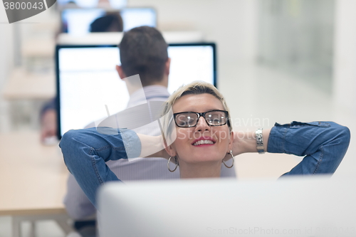 Image of startup business, woman  working on desktop computer