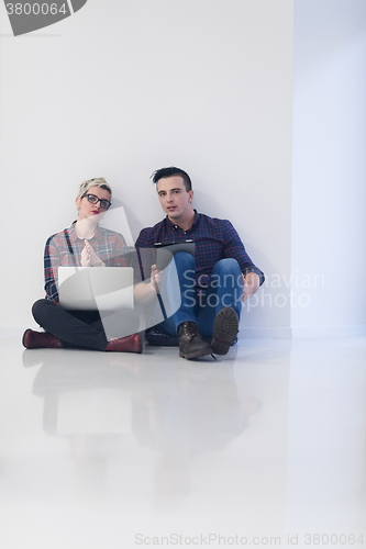 Image of startup business, couple working on laptop computer at office