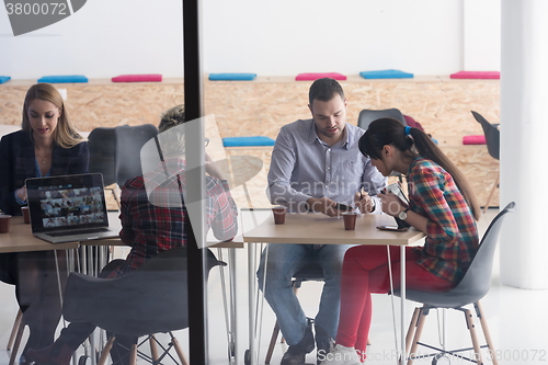 Image of startup business team on meeting at modern office