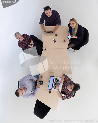 Image of aerial view of business people group on meeting