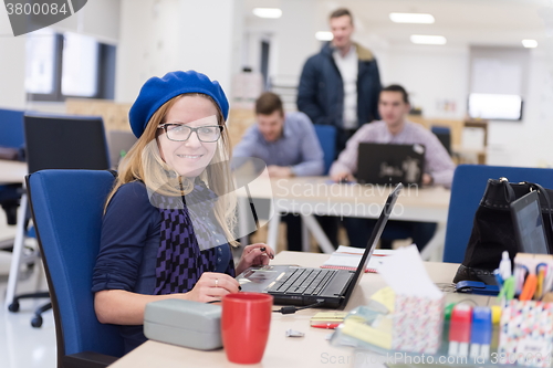 Image of startup business, woman  working on laptop