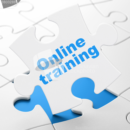 Image of Education concept: Online Training on puzzle background