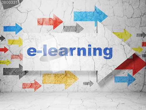 Image of Learning concept: arrow with E-learning on grunge wall background