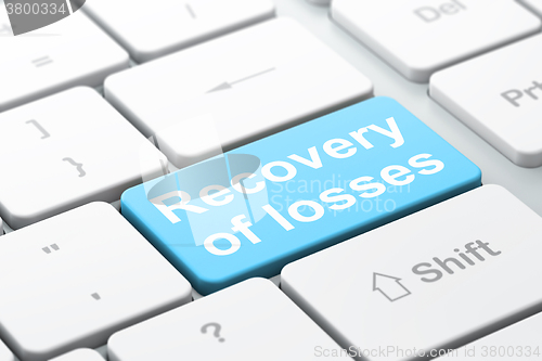 Image of Currency concept: Recovery Of losses on computer keyboard background