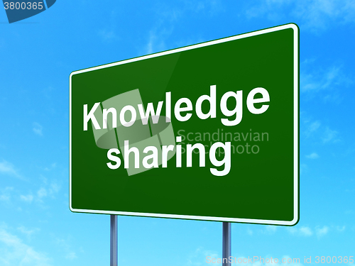 Image of Learning concept: Knowledge Sharing on road sign background