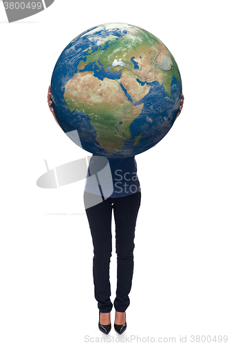 Image of Woman in full length holding earth globe
