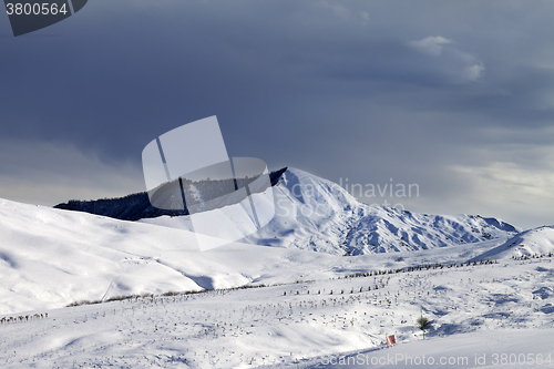 Image of Ski resort and sky before storm