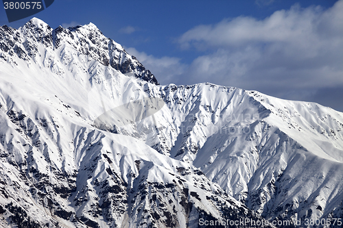 Image of Snowy sunlight mountains at nice day