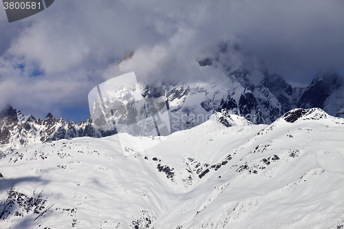 Image of Mount Ushba in haze at sunny day