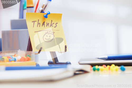 Image of Thanks text on adhesive note