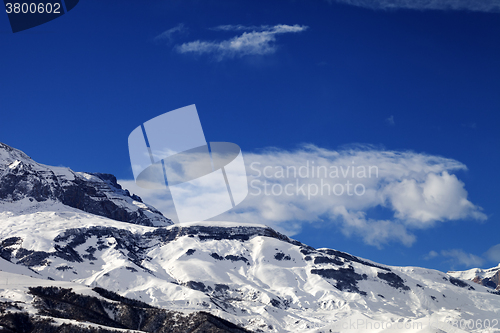 Image of Snowy rocks at nice sun day