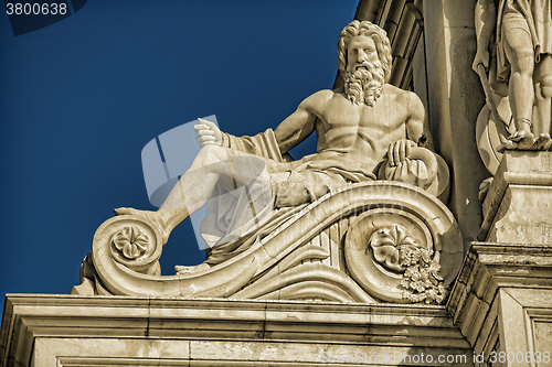 Image of Detail of the Rua Augusta Arch, a stone triumphal arch-like in L