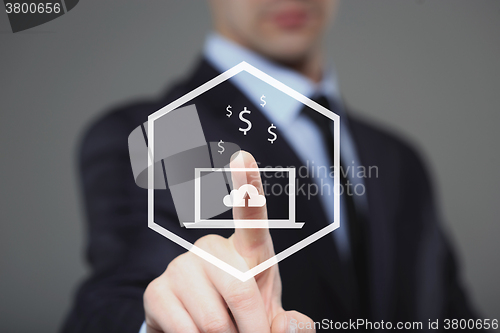 Image of businessman using modern computer, pressing button on virtual screen.