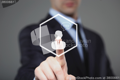 Image of Businessman clicking on live chat icon
