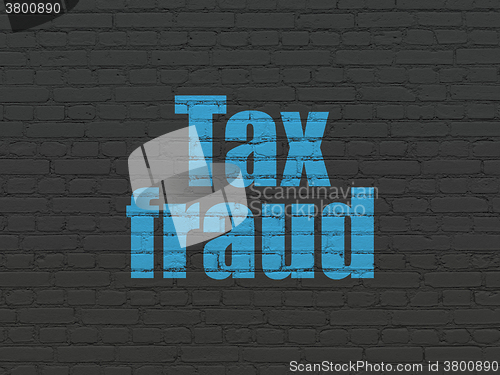 Image of Law concept: Tax Fraud on wall background