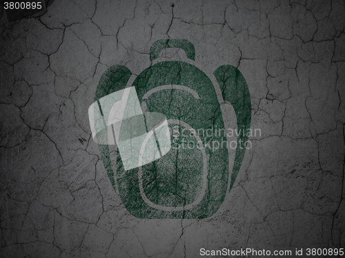 Image of Learning concept: Backpack on grunge wall background
