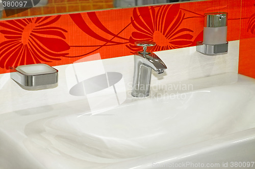 Image of Red faucet