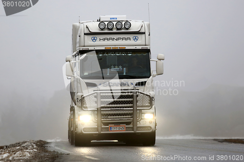 Image of Front View of White Scania Truck in Fog